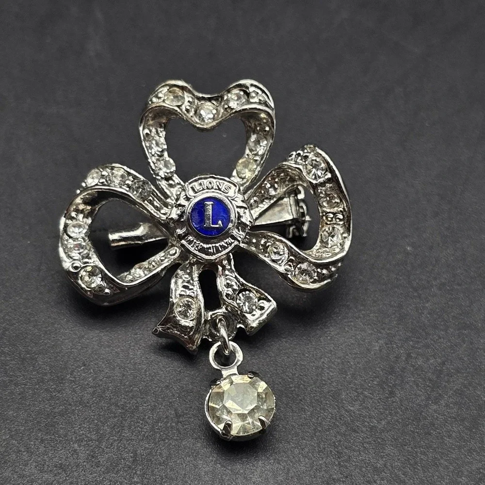 Vintage Lion's Club Rhinestone Bow Brooch Silver Tone